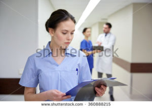 stock-photo-female-doctor-or-nurse-with-clipboard-at-hospital-360888215